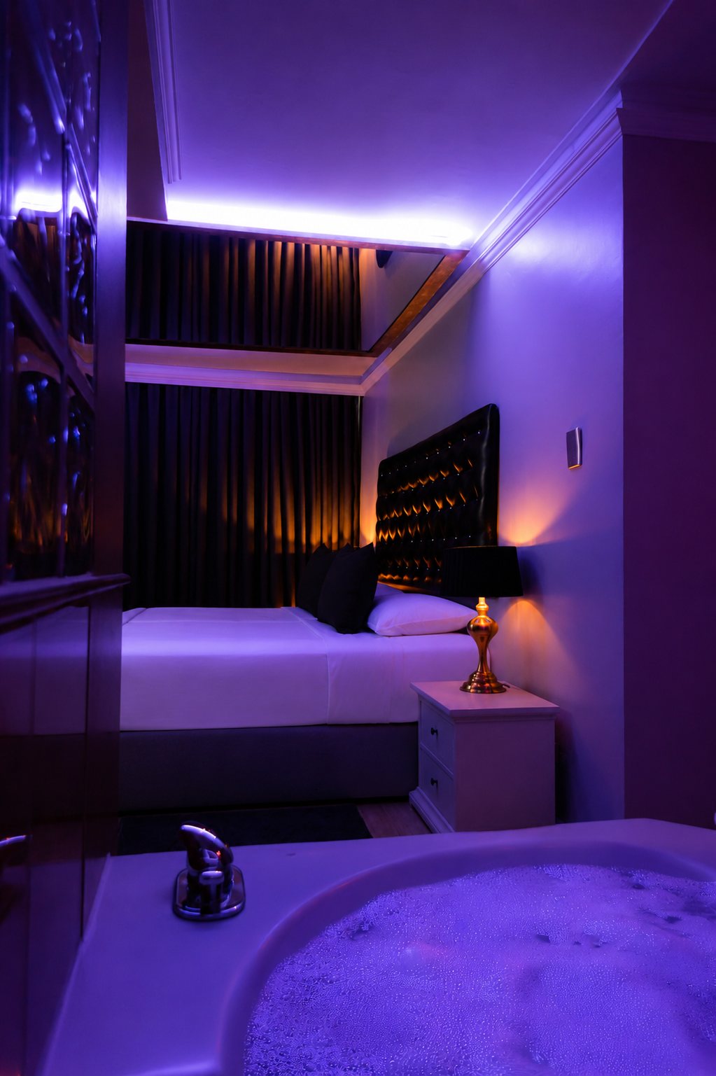Suite de Hotel La Pasión con jacuzzi e iluminación ambiental